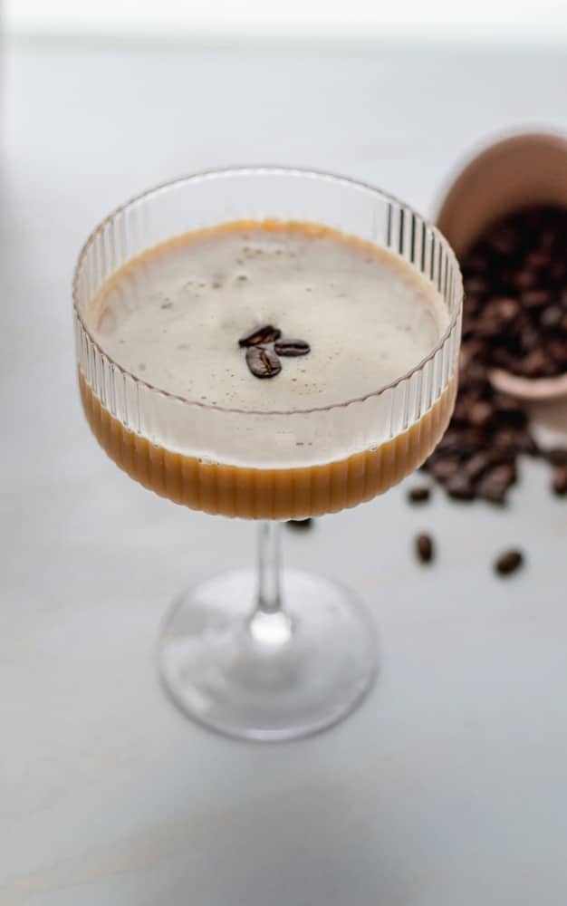 Vegan espresso martini garnished with espresso beans