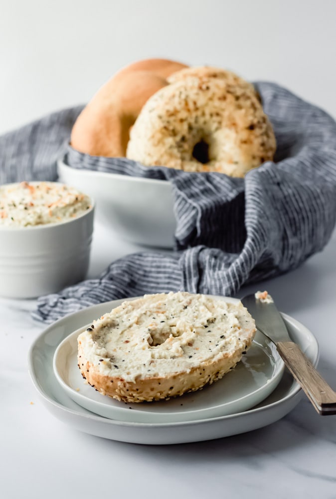 everything bagel topped with vegan everything cream cheese