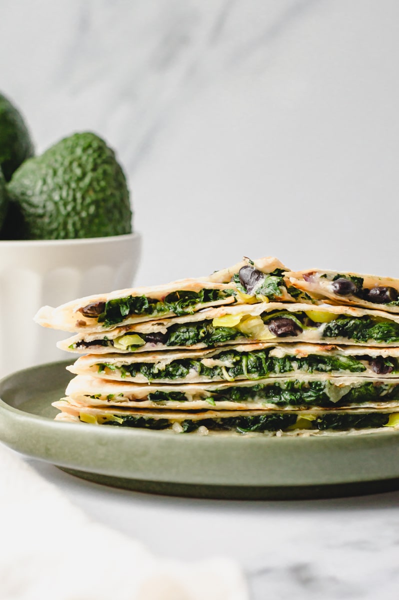 vegan gluten-free quesadilla made with dairy-free cheese, spinach, onion, and black bean