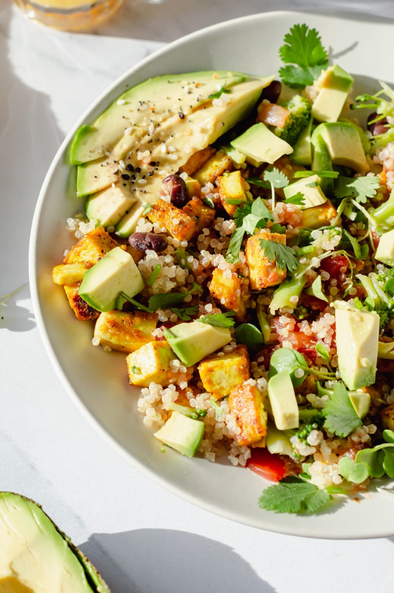 Vegan quinoa breakfast bowl with Chiquita banana, non-fat Greek yogurt.