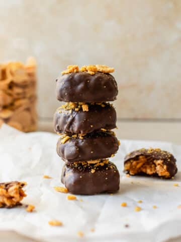 Stack of homemade vegan Butterfingers coated in chocolate