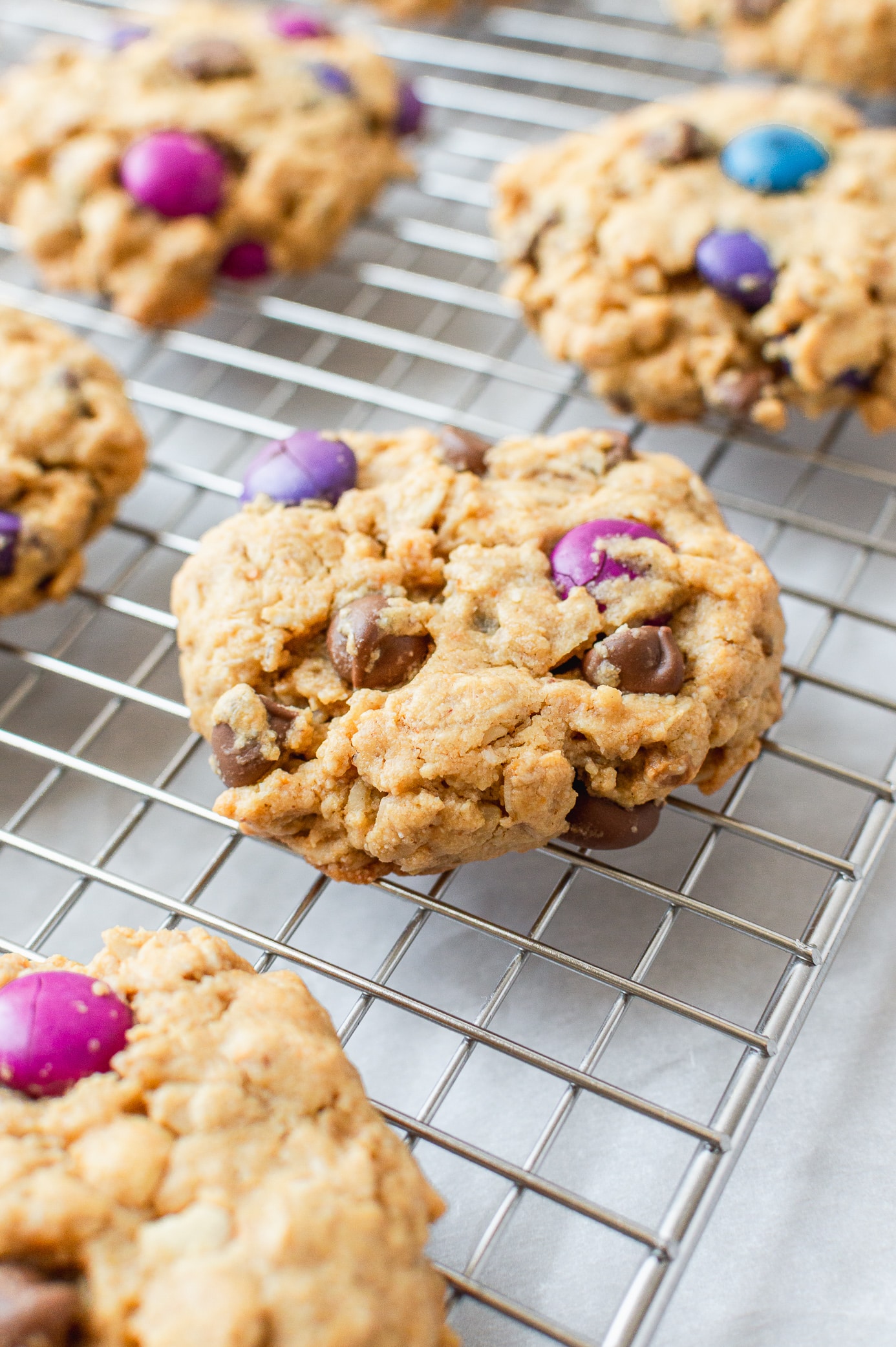 baked vegan monster cookies with slightly golden edges